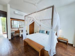 Calamansi Cove Villas 객실 침대