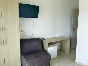 Una televisión o centro de entretenimiento en Summer Salento