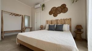 Кровать или кровати в номере Sweet Home G&G Lampedusa