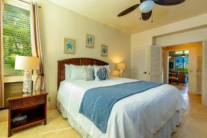 Giường trong phòng chung tại Grand Champions 67 by Coldwell Banker Island Vacations +31 ảnh