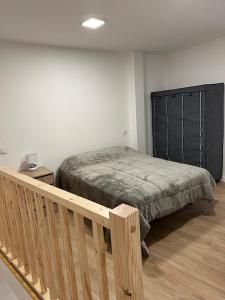 Ένα ή περισσότερα κρεβάτια σε δωμάτιο στο Apartamento en un lugar con encanto