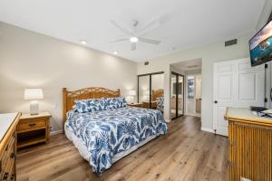 Ένα ή περισσότερα κρεβάτια σε δωμάτιο στο Big Island Waikoloa Fairways B-214 by Coldwell Banker Island Vacations +38 φωτογραφίες