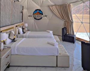 Postel nebo postele na pokoji v ubytování WADl RUM DESERT CAMP