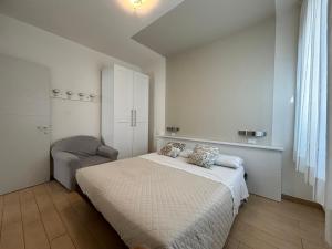 Кровать или кровати в номере Residenza Viel