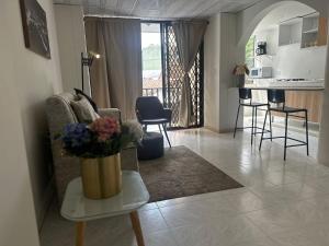 Kuchyň nebo kuchyňský kout v ubytování Apto moderno y acogedor