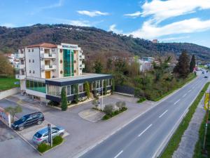 an aerial view of a building next to a road at Hotel Odissey Jaz in Budva