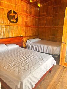 Postel nebo postele na pokoji v ubytování HotelCascol