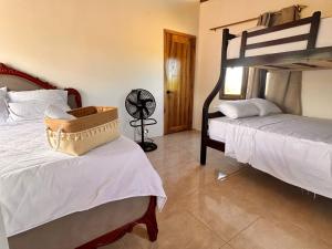 Postel nebo postele na pokoji v ubytování HotelCascol