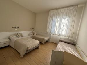 Кровать или кровати в номере Residenza Viel +37 фотографий