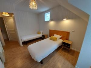 Llit o llits en una habitació de Appartement T3 hyper centre 6 pers