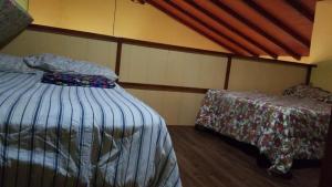 Postel nebo postele na pokoji v ubytování Casa de Campo La Trigue