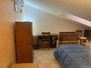 Ένα ή περισσότερα κρεβάτια σε δωμάτιο στο La luce dell'est +9 φωτογραφίες