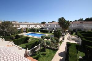 an aerial view of the garden and swimming pool at ARENDA Cristal 4 Pino Alto Holiday Home in Miami Platja