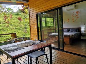 Postel nebo postele na pokoji v ubytování Thoas Lodge