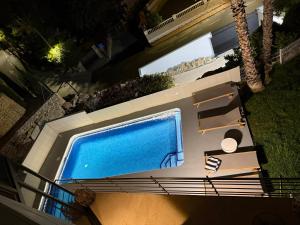 Kolam renang di atau dekat dengan Chalet with sea view in Alicante