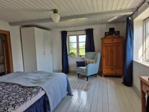 Voodi või voodid majutusasutuse Karlsborgsgården toas