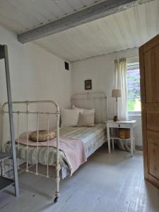 Postel nebo postele na pokoji v ubytování Karlsborgsgården