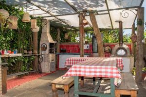 Εστιατόριο ή άλλο μέρος για φαγητό στο Casa ampla: 450 metros da praia de Geribá com piscina e churrasqueira