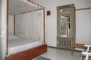 Ένα ή περισσότερα κρεβάτια σε δωμάτιο στο Casa ampla: 450 metros da praia de Geribá com piscina e churrasqueira +54 φωτογραφίες