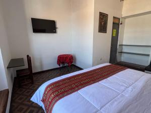 TV a/nebo společenská místnost v ubytování Mallku Wasi - Lodging Hotel Cusco