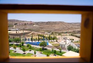 Swimmingpoolen hos eller tæt på مزرعة واكواخ ريف الازهر