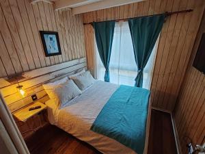 Postel nebo postele na pokoji v ubytování Algarrobo playa Canelo Cabaña opción Tinaja