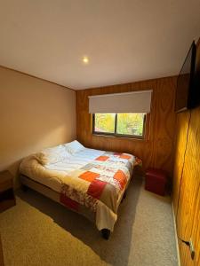 a bedroom with a bed and a window in it at Hotel Boutique Anttuy in Las Trancas +81 photos