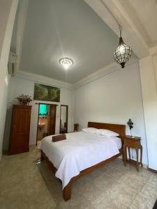 Postel nebo postele na pokoji v ubytování Ogek Home Stay