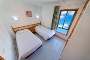 Katil atau katil-katil dalam bilik di Salt Apartments Green Ocean