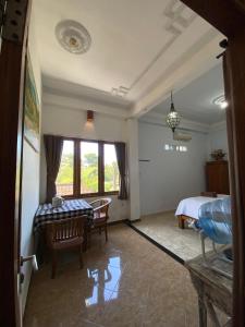 Posezení v ubytování Ogek Home Stay