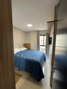 Postel nebo postele na pokoji v ubytování Edifício Rigiero