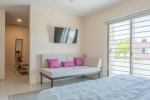Postel nebo postele na pokoji v ubytování acogedora casa con hospedaje para 2 personas + 37 fotografií