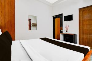 Katil atau katil-katil dalam bilik di SPOT ON The Orchid Residency