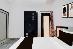 Katil atau katil-katil dalam bilik di SPOT ON The Orchid Residency