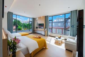 Ένα ή περισσότερα κρεβάτια σε δωμάτιο στο Yuetu Resort Hotel