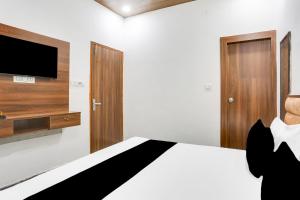 TV a/nebo společenská místnost v ubytování Hotel O The signature stay + 21 fotografií