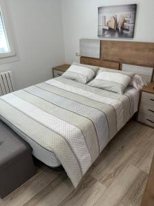 Postel nebo postele na pokoji v ubytování A casa do avó