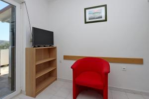 Μια τηλεόραση ή/και κέντρο ψυχαγωγίας στο Apartment Barbat 14247c