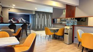 Kuchyň nebo kuchyňský kout v ubytování Serenzza Hotel