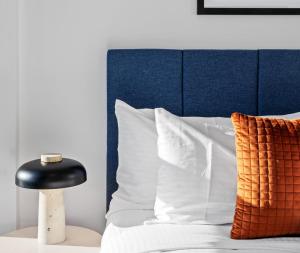 Queen's Wharf Residences客房内的一张或多张床位