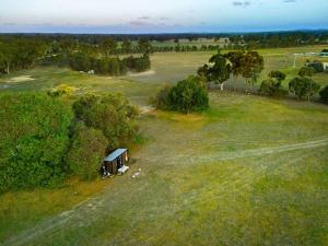 an aerial view of a small house in a field at Pyrenees Views by Tiny Away in Avoca