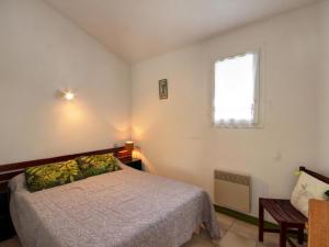 a bedroom with a bed and a window at Charmant Gîte à la Campagne avec Cheminée, Terrasse et Jardin - Animaux Bienvenus - FR-1-496-164 in Usson-en-Forez