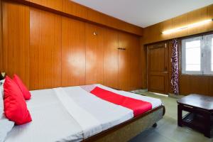 Postel nebo postele na pokoji v ubytování Hotel O Unique