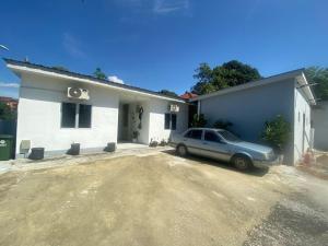 a car parked in front of a house at Sammy Hoomestay Ipoh in Ipoh