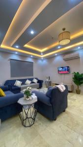 Ruang duduk di شقق قولد المفروشة +23 gambar