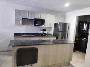 Η κουζίνα ή μικρή κουζίνα στο Horux Hostal
