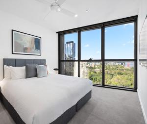 Queen's Wharf Residences客房内的一张或多张床位