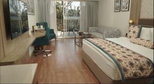 Fortune Park Moksha, Mcleodganj - Member ITC Hotels' Group客房内的一张或多张床位