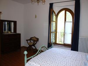 Posteľ alebo postele v izbe v ubytovaní Farmhouse in Vinci near Leonardo Museum