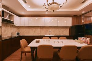 Kuchyň nebo kuchyňský kout v ubytování Mercury Boutique Hotel
